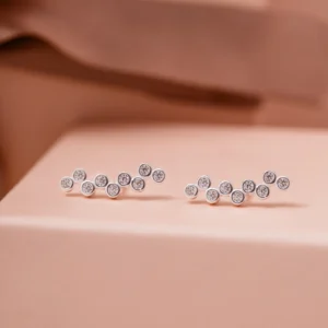 Brinco 9 Zircônias Cravação Inglesa