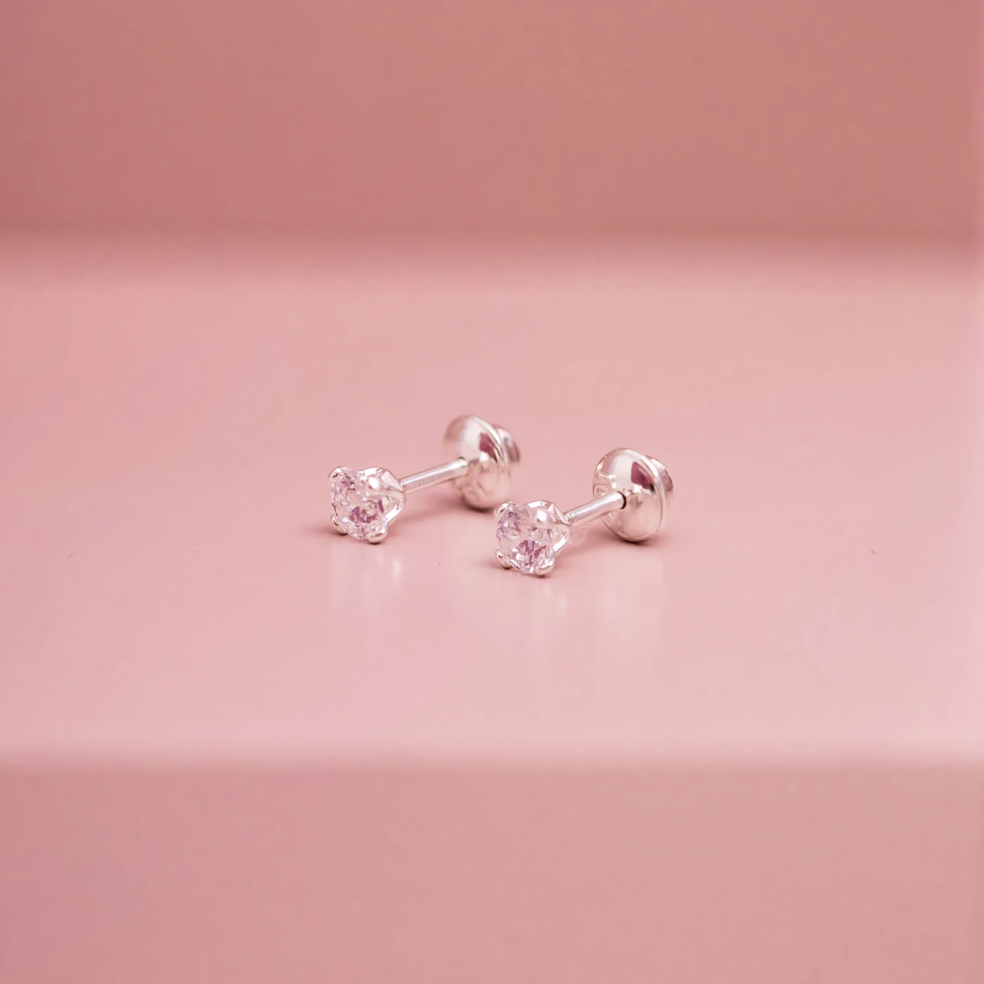 BRINCO SEGUNDO FURO PRATA 925 PONTO DE LUZ ZIRCÔNIA 3MM